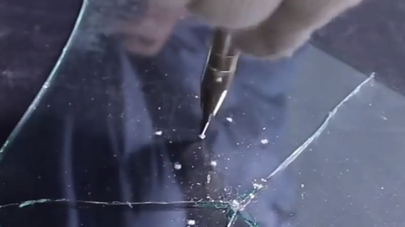 automatic center punch for glass breaking